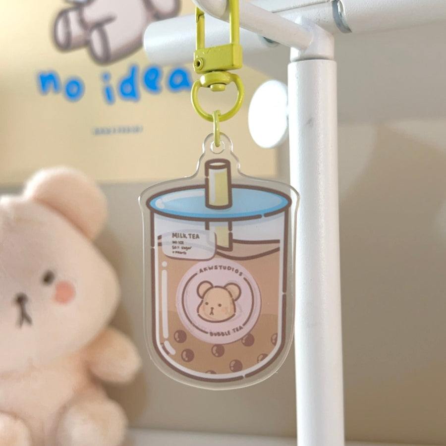Wonki Studios' acrylic keychain featuring a Taro the Bear branded bubble tea drink